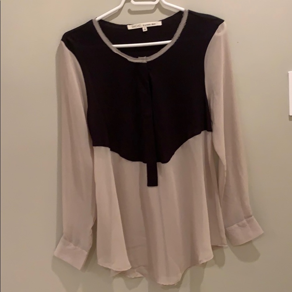 Solid black and sheer nude blouse